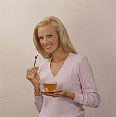 Young woman with a cup of tea