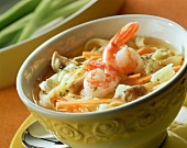 Colourful noodle soup with shrimps