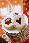 Spitzbuben (jam biscuits) with redcurrant jelly on plate