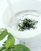 A bowl of herb quark with basil