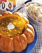 Brazilian pumpkin soup with shrimps and mango