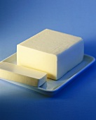 Butter with a piece cut off