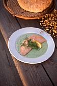 Grilled salmon on dill sauce