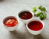 Chinese sauce, chili sauce & coriander sauce in bowls
