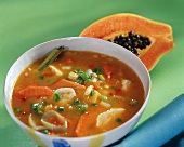 Balinese papaya soup with ginger, fish and curry