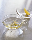 A bowl of lemon water for washing fingers at table