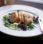 Fried scallops on lettuce