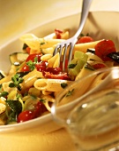 Penne with peppers, courgettes and cherry tomatoes