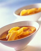 Mango slices in rose wine