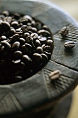 Coffee beans in a wooden bowl