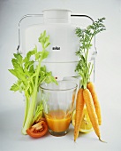 Electric juicer (Braun) with vegetables