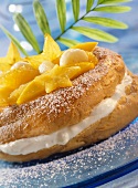Choux pastry ring with exotic fruit