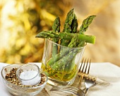 Marinated green asparagus in a glass