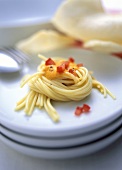 Spaghettini with diced tomatoes and pumpkin & coconut sauce