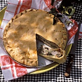Rabbit and vegetable pie, a piece cut