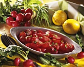 A bowl of steamed radishes in butter and lemon