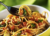 Spaghetti with broccoli and tomatoes