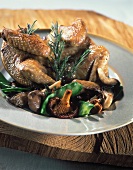 Pigeon with goose liver stuffing, mushrooms & mangetouts