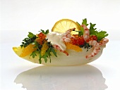 Shrimp and orange salad in chicory leaf