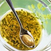 Making herb dressing with mustard