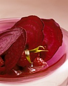 Beetroot slices with strawberries