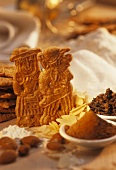 Shaped biscuits (Spekulatius) with baking ingredients