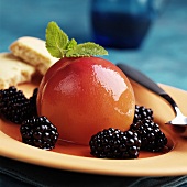 Poached peach with blackberries