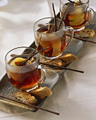 Three cups of cherry and amaretto punch