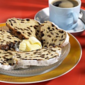 Christmas loaf (stollen) with butter curls & a cup of coffee