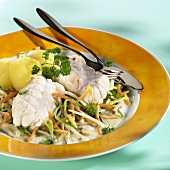 Monkfish with julienne vegetables and boiled potatoes