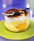Peach mousse with cream and caramel topping