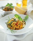 Pan-cooked rice dish with vegetables and herbs