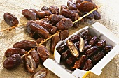 Dried dates on the stalk and in packaging