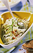 White cabbage salad with diced bacon and chives