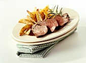 Marinated ostrich fillet with potato wedges