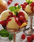 Mango ice cream with raspberry sauce