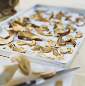 Sliced ceps laid out to dry