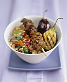 Lamb kebabs on tabbouleh