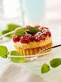 Raspberry tartlet with ricotta and lime cream