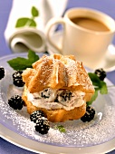 Cream puff with blackberry cream