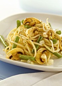 Spaghetti with beans, sprouts and mushrooms from the wok