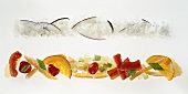Line of candied fruit and line of coconuts