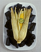 Barbecued corncob with herb butter