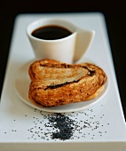 Poppy seed & cinnamon pastry and a cup of coffee