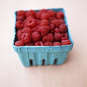 Raspberries in a cardboard punnet