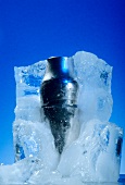 Cocktail shaker in block of ice