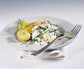 Boiled potatoes with carrot and herb quark