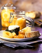 Pickled mustard (Mostarda) with bread and fresh goat's cheese