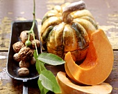 Autumn still life with walnuts and pumpkin