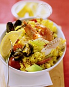 Paella in a small white bowl